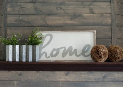 Mantel with home sign